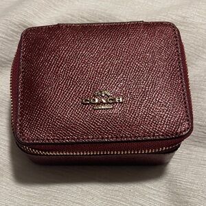 Coach metallic Burgundy Pebbled Leather Zip Jewelry Organizer with Gold Hardware